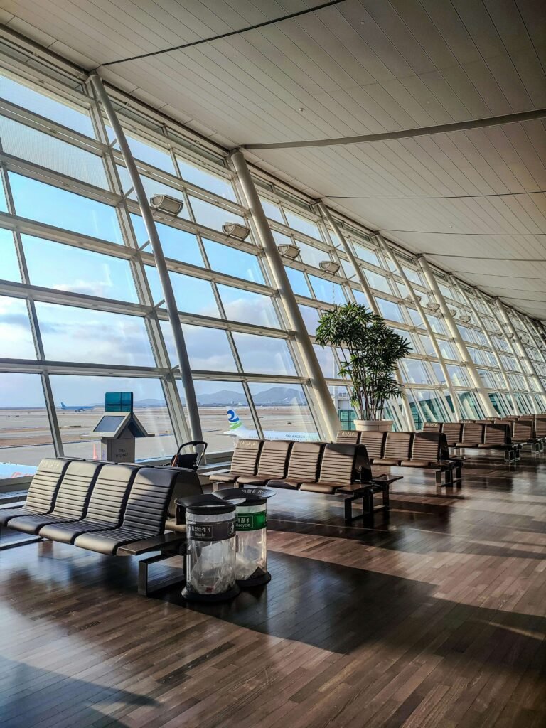 A traveler setting up an eSIM for smooth Credit Card Use in Korea at Incheon Airport