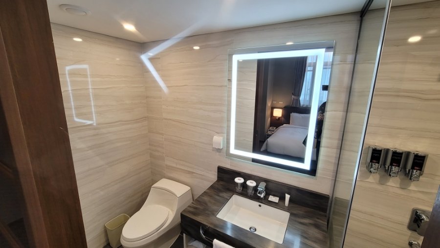 Well-maintained and sleek bathroom interior with high-quality amenities for a comfortable stay at ENA Suite Hotel Namdaemun review.