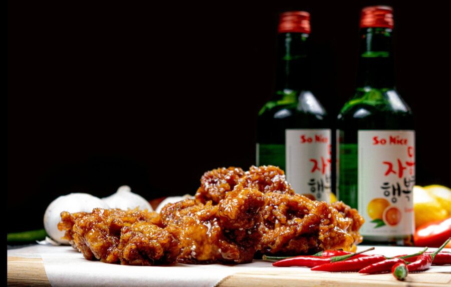 A delicious spread of Korean fried chicken delivered to a hotel using Korean delivery apps for foreigners