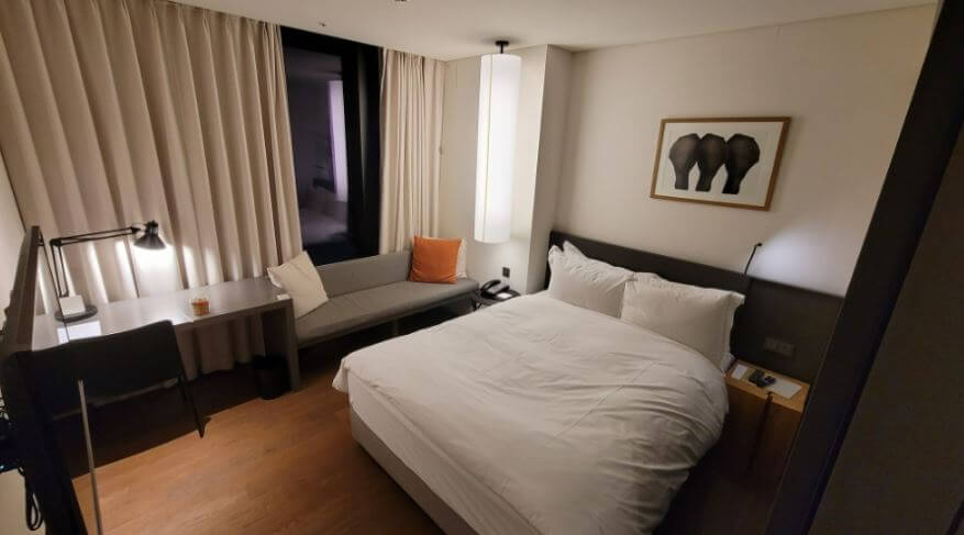 A modern and cozy interior of a Standard Double room at Shilla Stay Guro, perfect for solo or couple stays